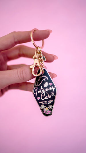 Karma Getaway Car T.S Motel Keychain