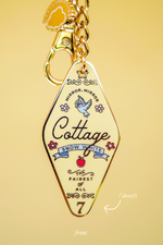 Snow White's Cottage Motel Keychain