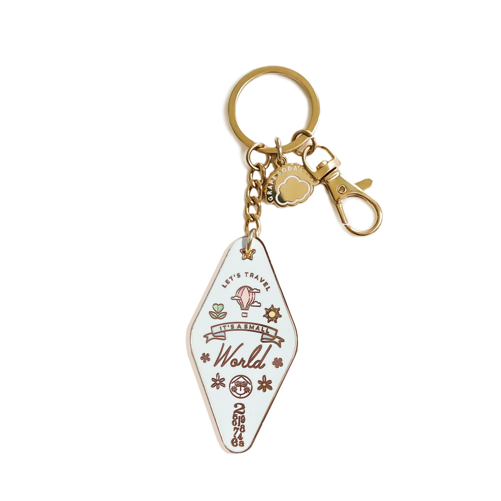 Travel the Small World Motel Keychain